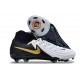 Bota Nike Phantom Luna II Elite FG Blanco Negro Mtlc Dorado Moneda