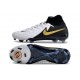 Bota Nike Phantom Luna II Elite FG Blanco Negro Mtlc Dorado Moneda