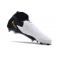 Bota Nike Phantom Luna II Elite FG Blanco Negro Mtlc Dorado Moneda