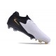 Zapatillas Nike Phantom Luna 2 Elite L FG Blanco Negro Mtlc Dorado Moneda