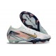 Bota Nike Zoom Mercurial Vapor XVI Elite FG MDS Casi Verde Dorado metalizado Moneda
