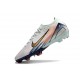Bota Nike Zoom Mercurial Vapor XVI Elite FG MDS Casi Verde Dorado metalizado Moneda